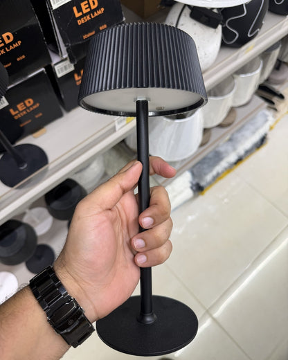 Aura cordless LED table lamp real size held in hand